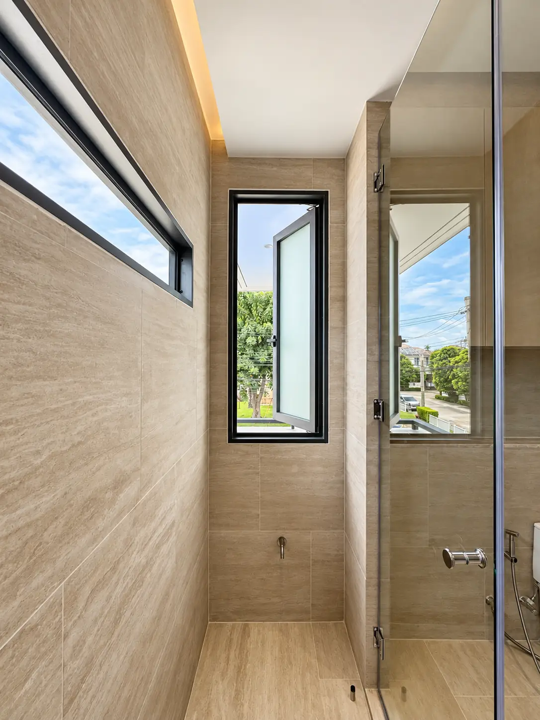 Black Aluminum Casement Window with Frosted Glass in Modern Bathroom